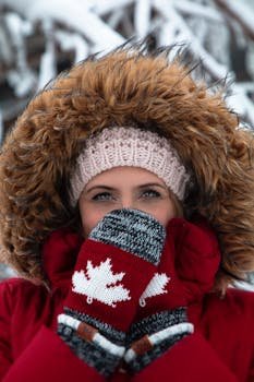 pexels-photo-2698557-2698557 Woman bundled up in winter clothing at Niagara Falls, Canada.